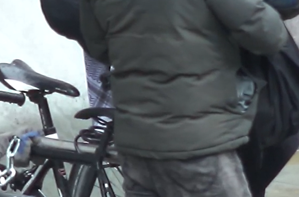 CCTV footage shows the pair trying to break the lock\u200b