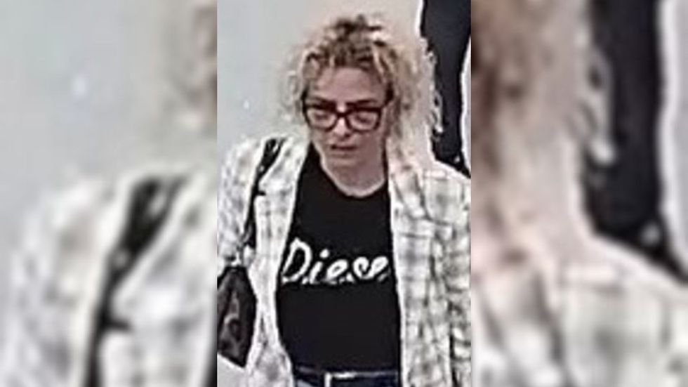 CCTV image of woman