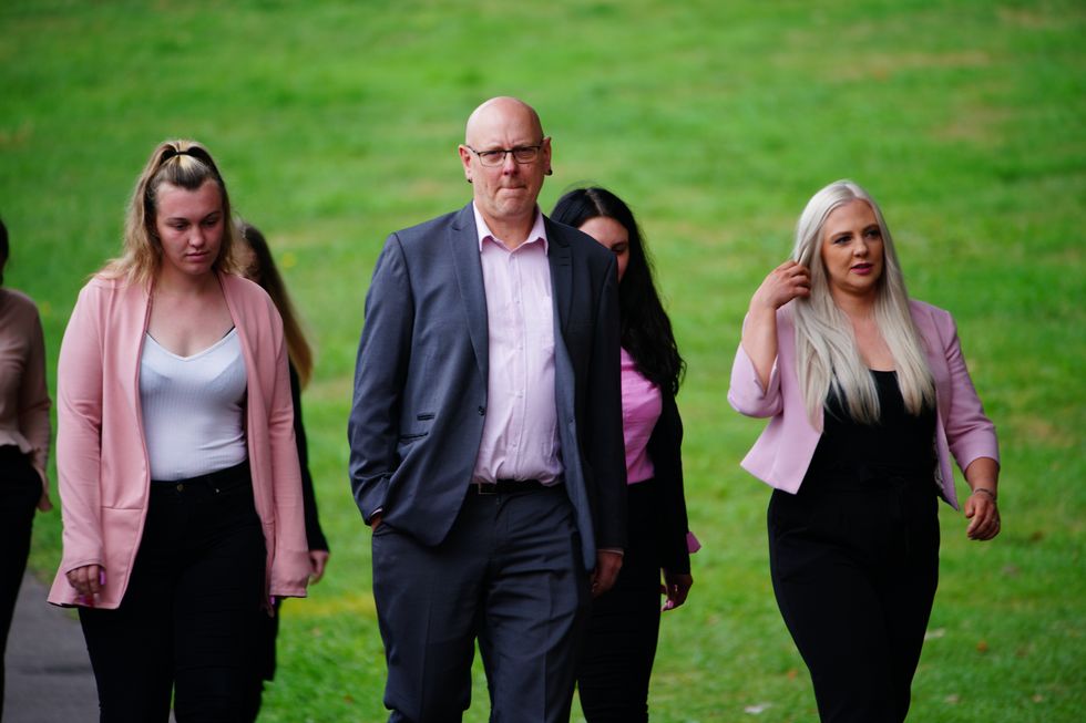 Celia Marsh's husband Andy Marsh (centre), and her family arrive for her inquest at Avon and Somerset Coroner's court in Bristol. Ms Marsh, 42, a dental nurse from Melksham, Wiltshire, died on December 27 2017 fter eating a super-veg rainbow flatbread from a Pret a Manger store in Bath, Somerset. Picture date: Tuesday September 6, 2022.