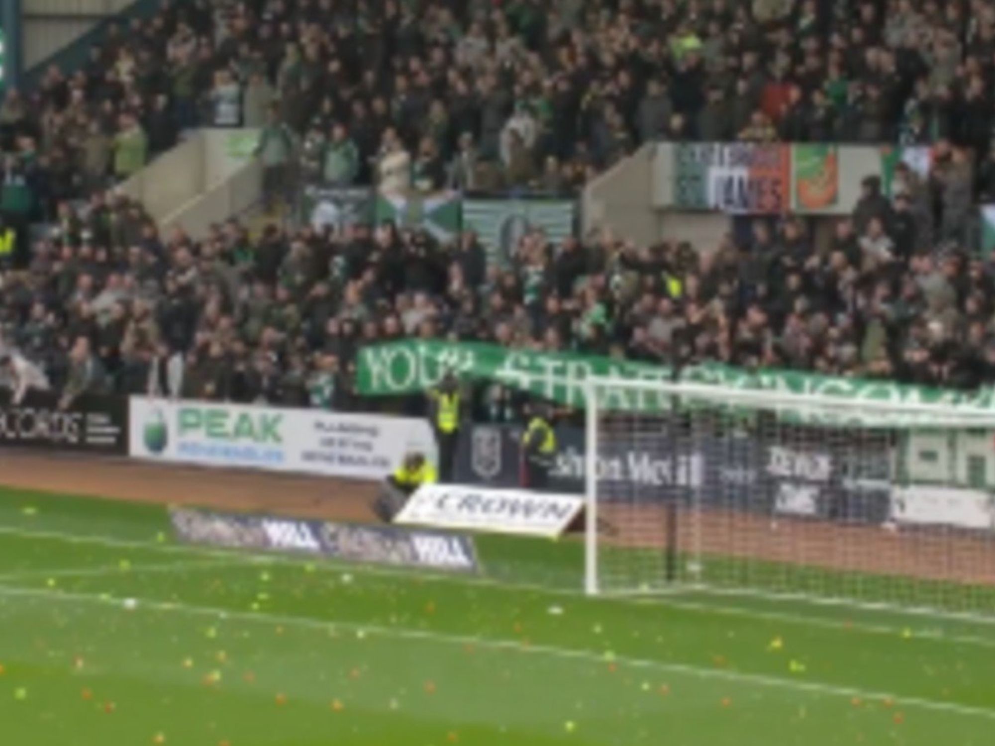 Celtic fans delay match with Dundee after protest involving balls and oranges being thrown on pitch
