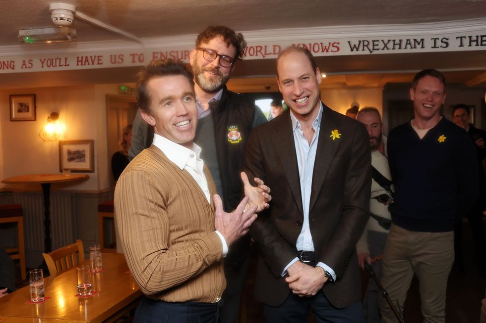 Chairman of Wrexham AFC Rob McElhenney, Executive Director of Wrexham AFC Humphrey Ker and Prince William, Prince of Wales
