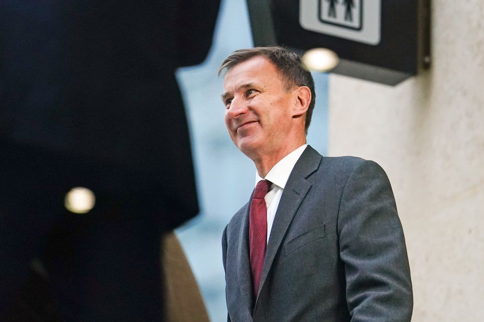 Chancellor Jeremy Hunt speaking to the media at Victoria Place Shopping Centre, Woking, in response to the Bank of England Monetary Policy Report, in which they raised interest rates to 4% from 3.5%. Picture date: Thursday February 2, 2023.