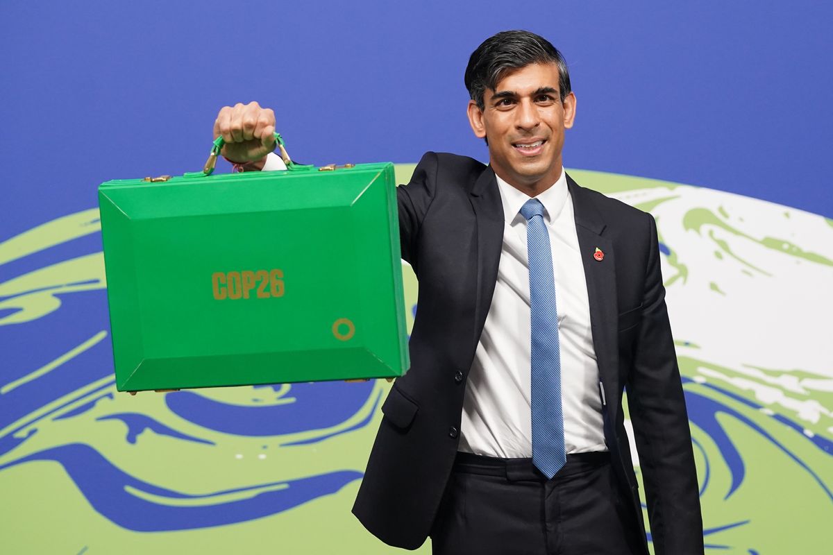 Chancellor Rishi Sunak holds his Green Box at the Cop26 summit