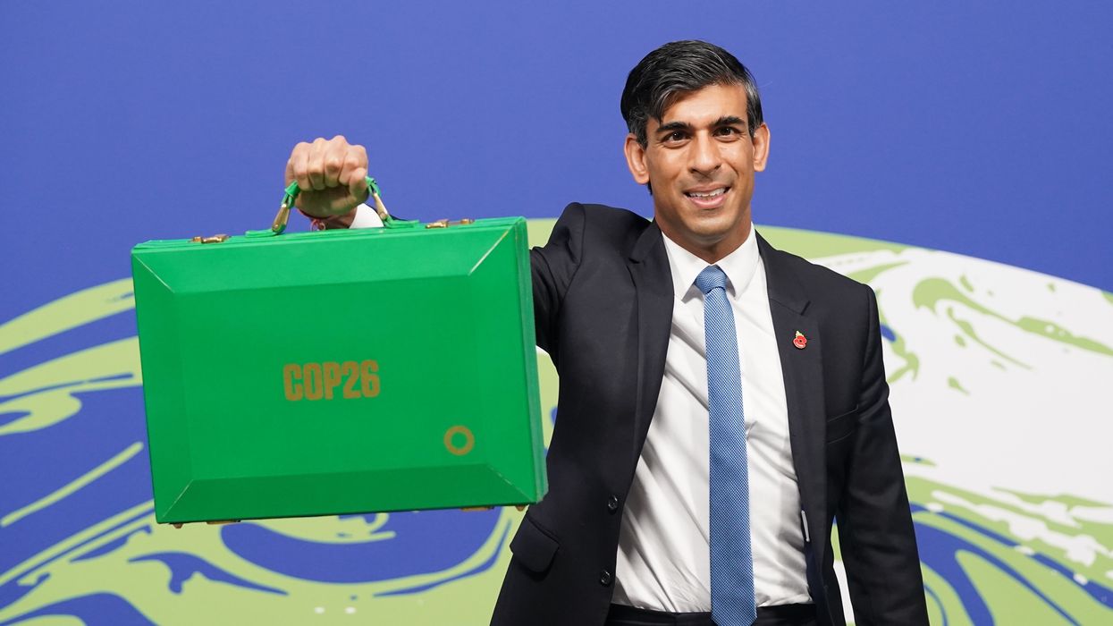 Chancellor Rishi Sunak holds his Green Box at the Cop26 summit