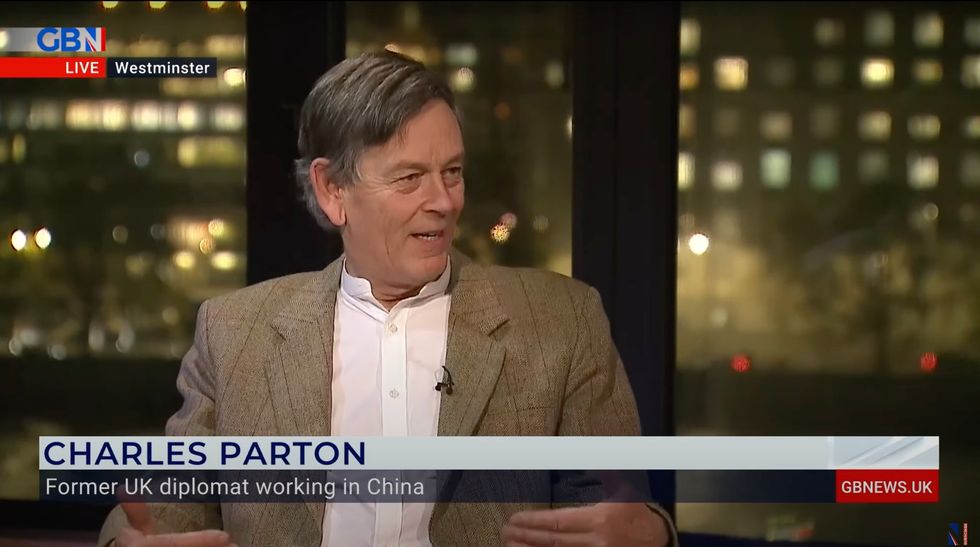 Charles Parton, author of the report has warned that microchips could pose a 'Trojan horse' threat