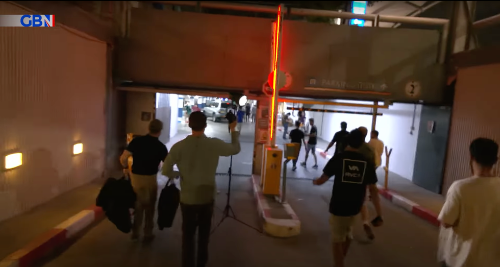 Charlie Peters and crew run to safety