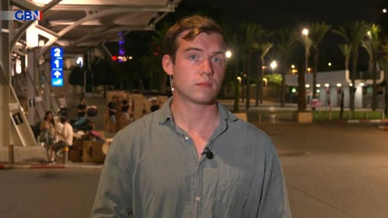 WATCH: “We’ve got to go!” GB News reporter rushes for cover as warning alarms raised in Tel Aviv