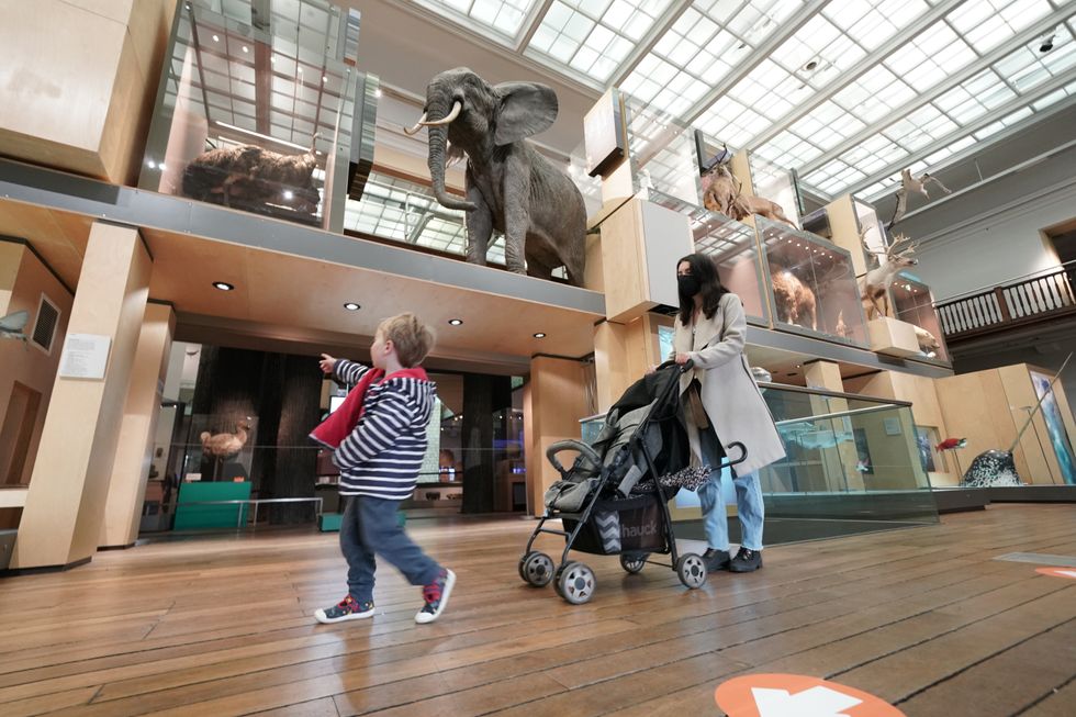 Charlotte Griffiths, 25, with her three year old son Robert from Morpeth Northumberland at the Great North Museum in Newcastle, as indoor hospitality and entertainment venues reopen to the public following the further easing of lockdown restrictions in England. Picture date: Monday May 17, 2021.