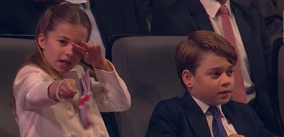 Charlotte\u2019s sweet reaction was caught by cameras as the eight-year-old pointed her hand-held Union Jack towards her father