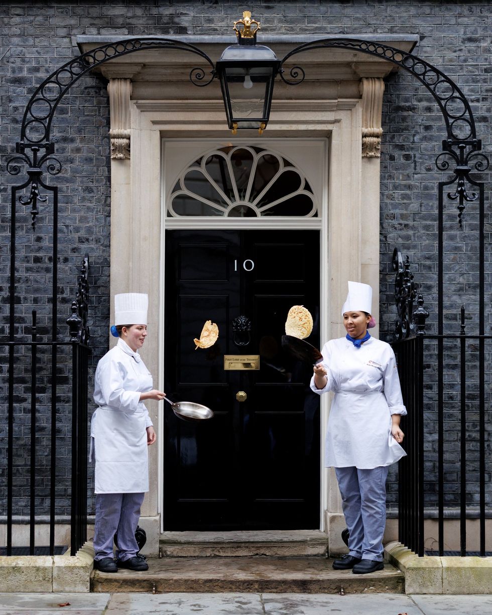 Chefs flipping pancakes outside Downing Street