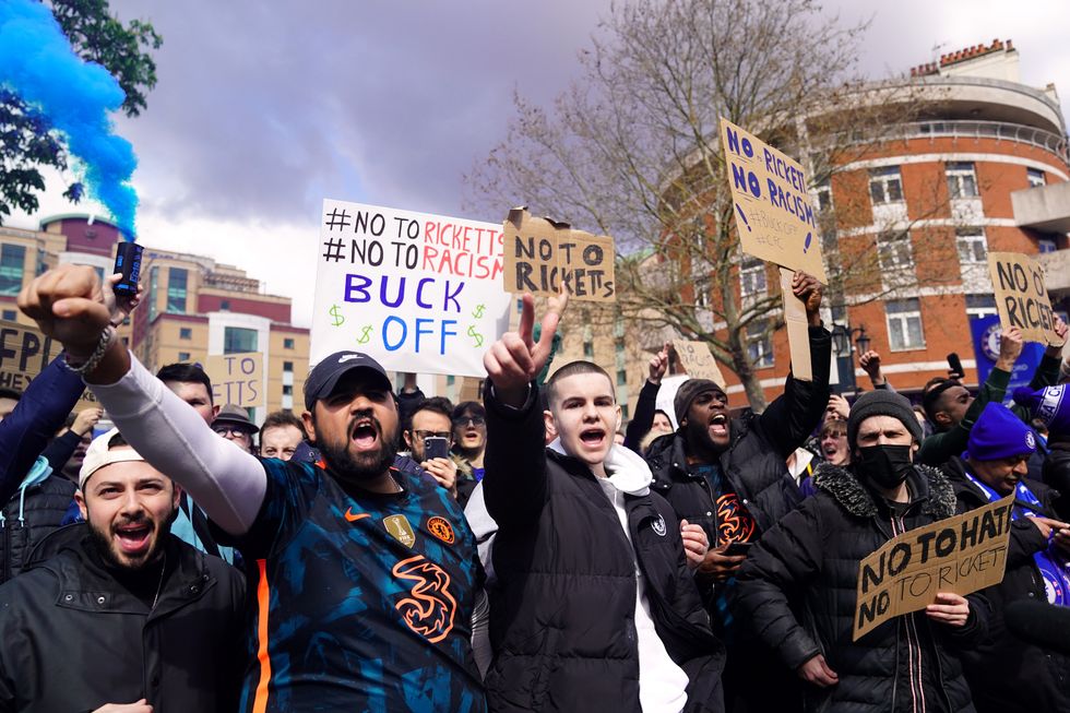 Chelsea fans protest outside the ground against the potential sale of the club to the Ricketts family ahead of the Premier League match at Stamford Bridge, London. Picture date: Saturday April 2, 2022.