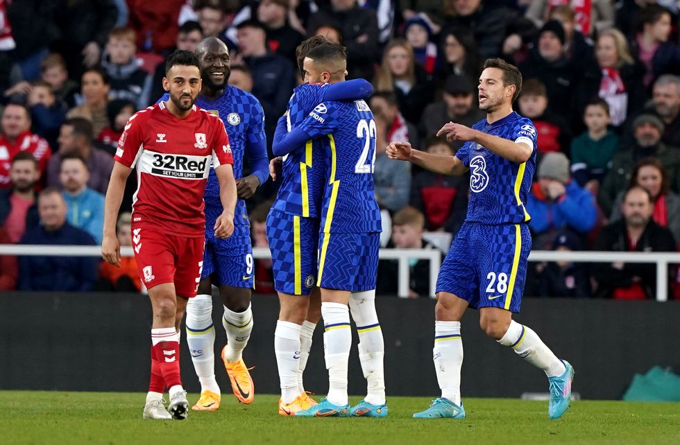 Chelsea's Hakim Ziyech (centre) celebrates scoring their side's first goal of the game during the Emirates FA Cup quarter final match at the Riverside Stadium, Middlesbrough. Picture date: Saturday March 19, 2022.