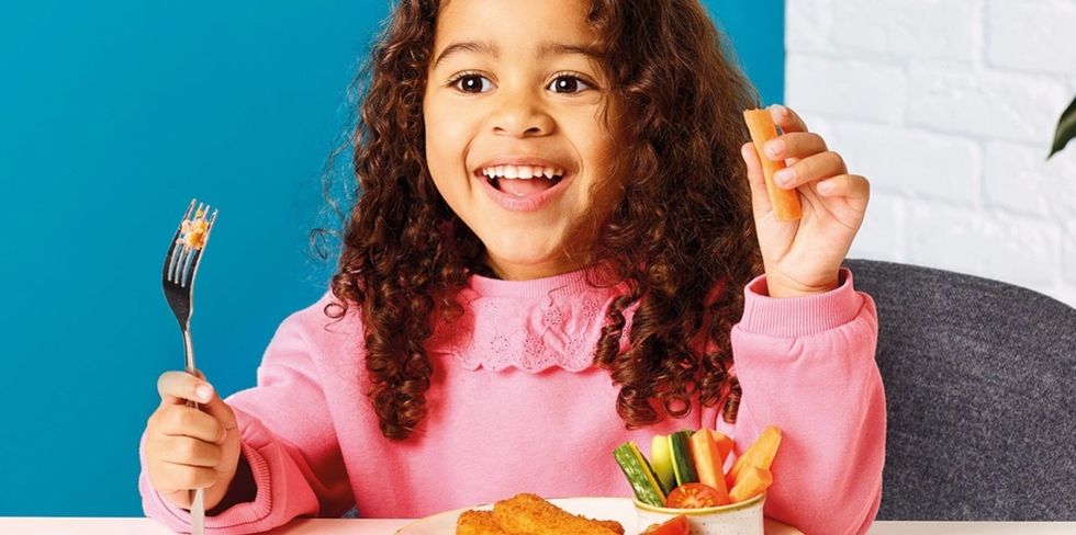 Child eating at Tesco