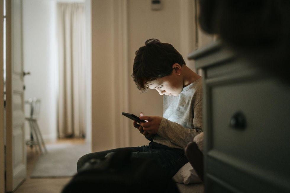 Child looking at phone