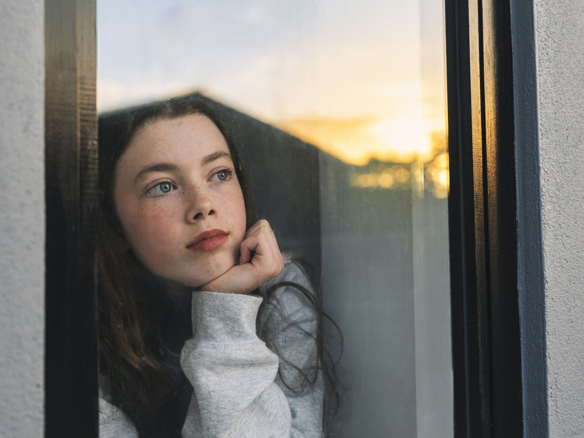 Child looking out of window