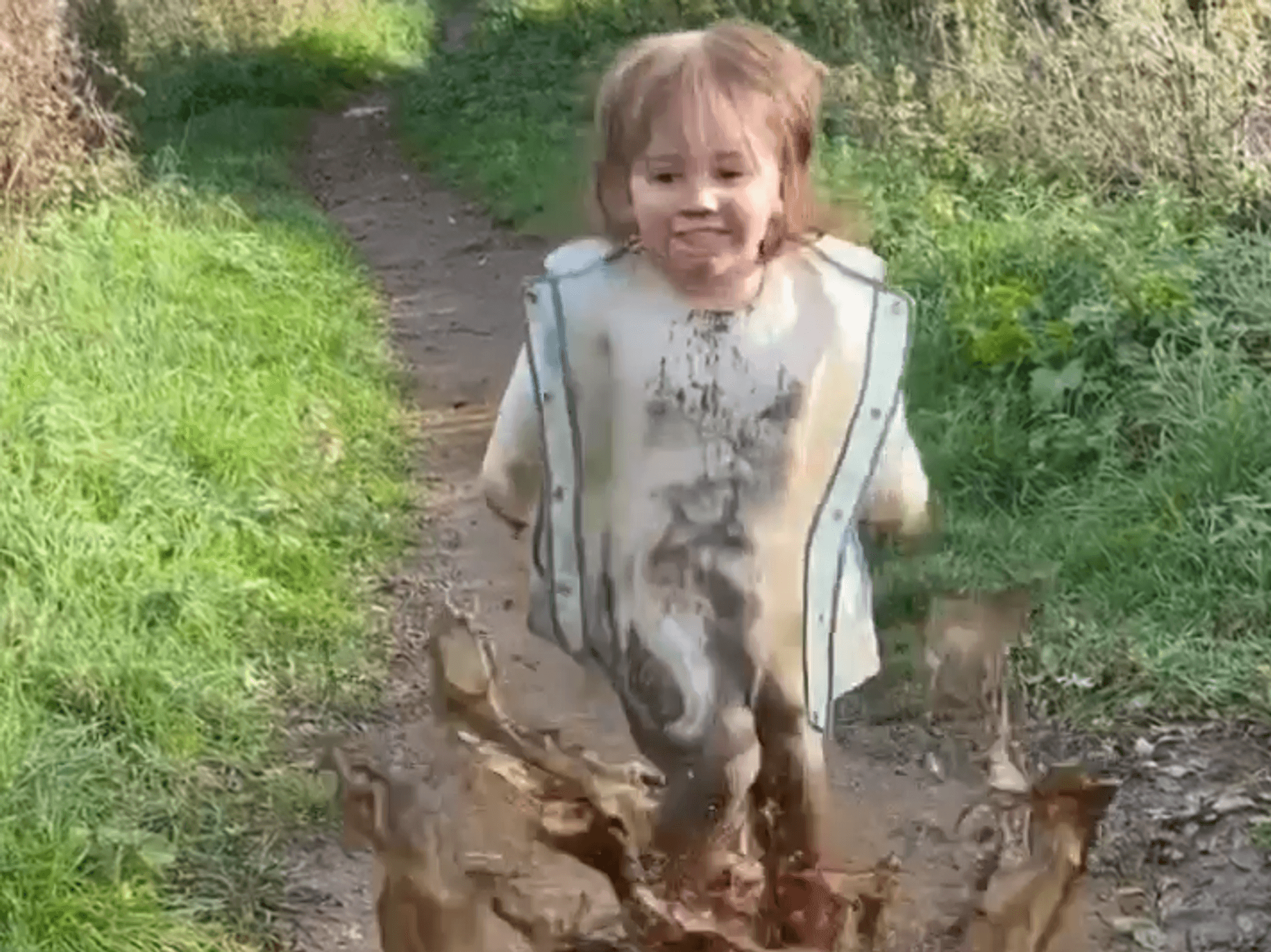 Child participating in World Puddle Jumping Championship