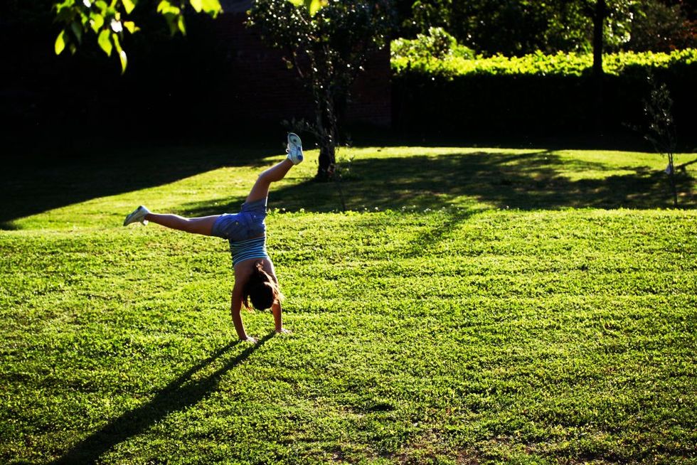 Child playing in garden