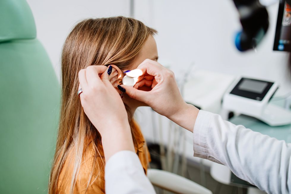 CHILD WITH HEARING AID