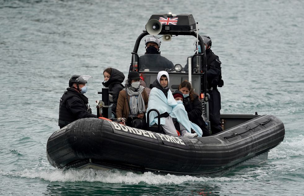 Children among group of people thought to be migrants are brought in to Dover, Kent, onboard a Border Force vessel, following a small boat incident in the Channel
