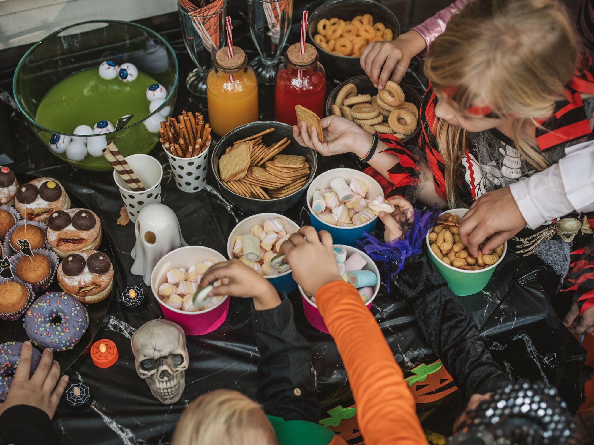 Children eating Halloween treats
