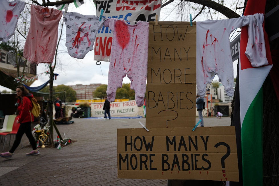 Children's clothing ion display as people take part in a Palestine Solidarity Campaign rally in central London\u200b