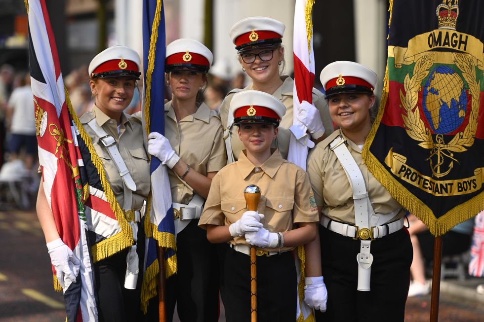 Children take part in a July 12 parade in Belfast