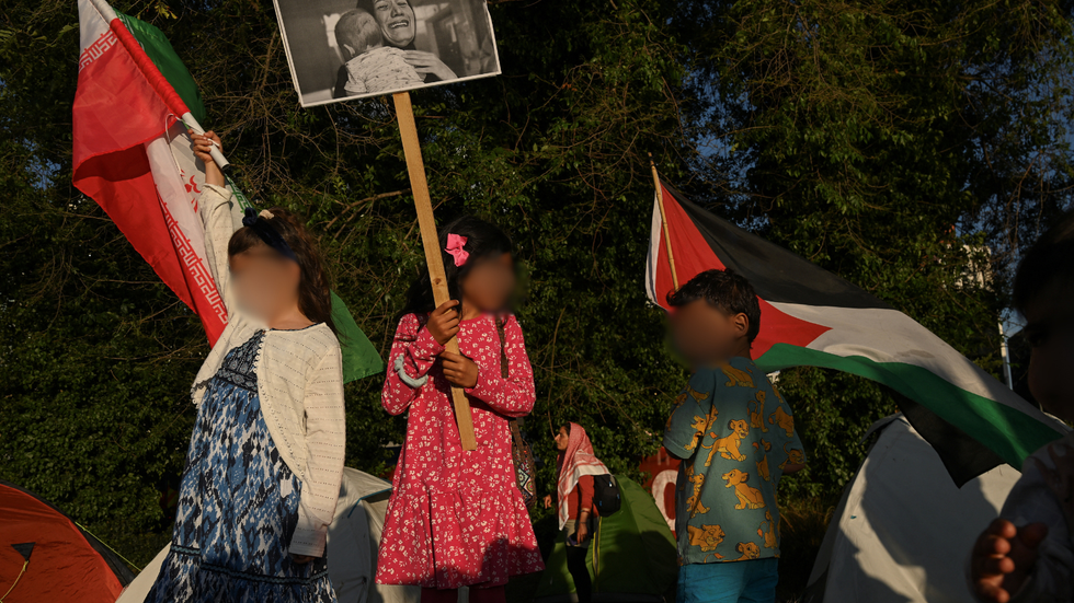 Children take part in 'Stop Bombing Iran' protest on streets of London