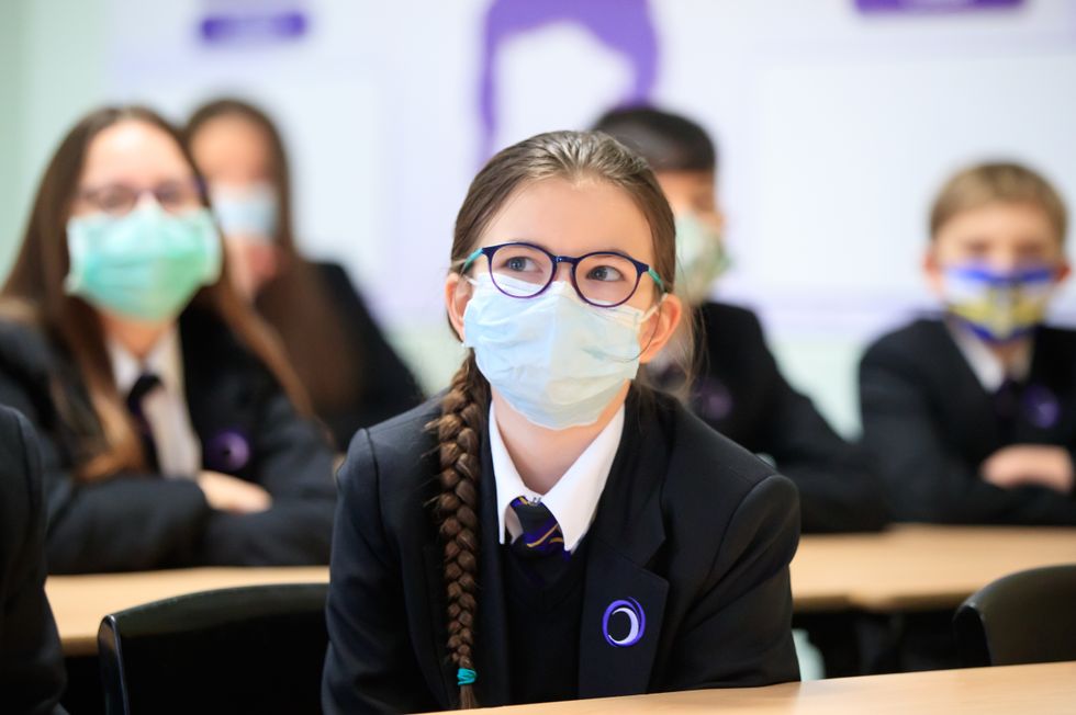 Children wearing facemasks during a lesson at Outwood Academy in Woodlands, Doncaster in Yorkshire.