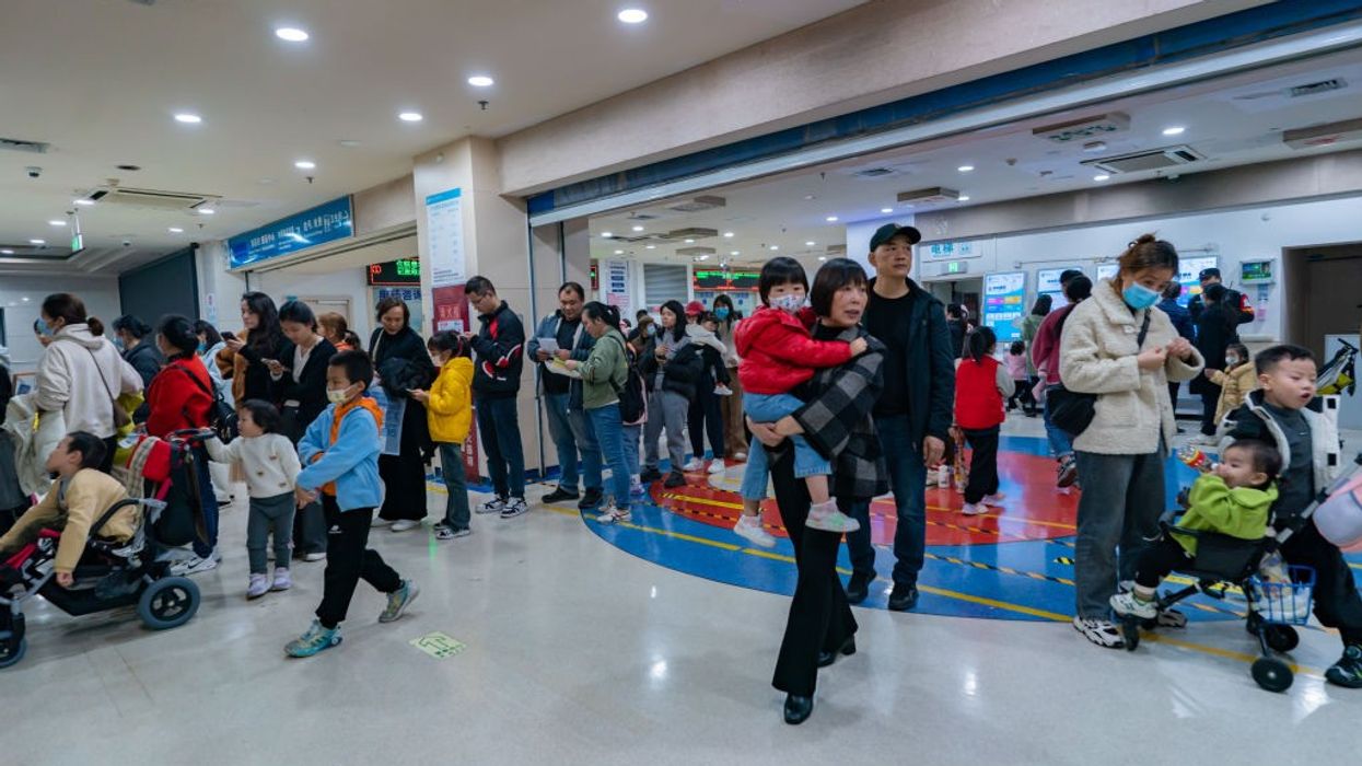 China 'cover up' fears over mystery illness as cases of sickness spread