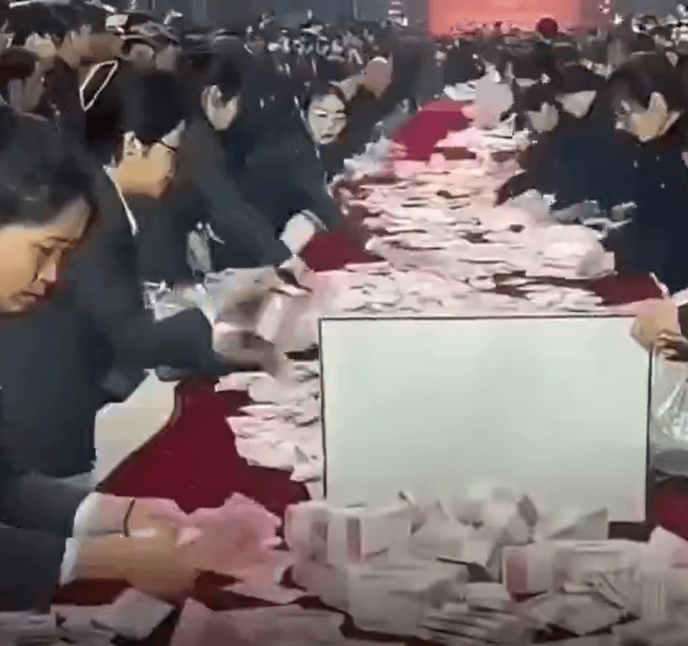 Chinese company lays out money for employees