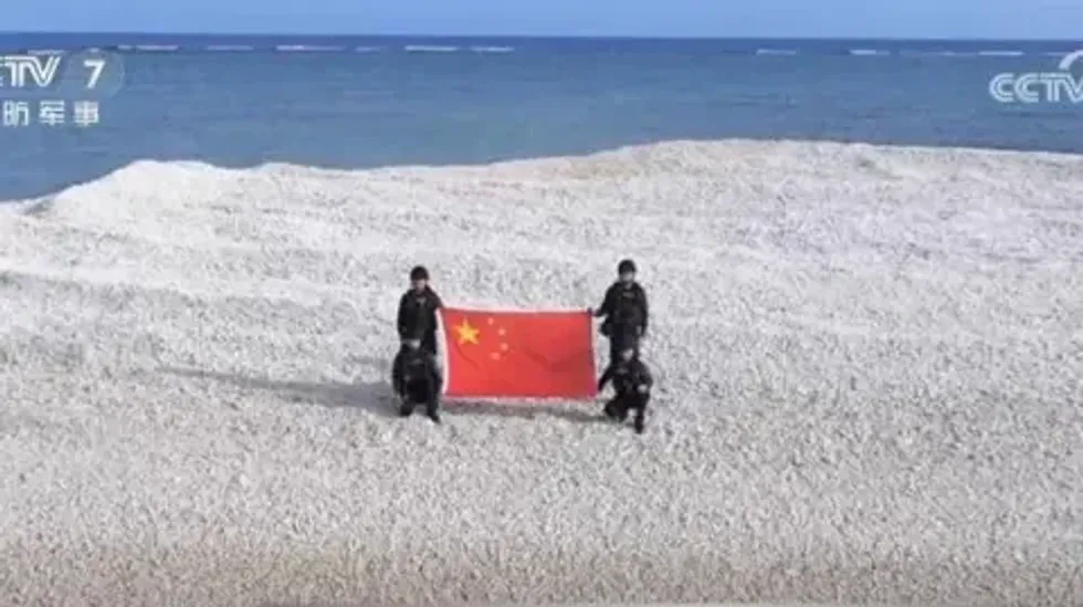 Chinese officers on contested island