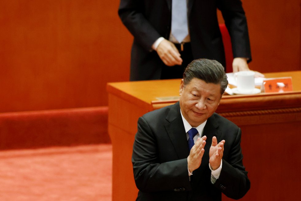 Chinese President Xi Jinping applauds at a meeting commemorating the 110th anniversary of Xinhai Revolution at the Great Hall of the People in Beijing, China October 9, 2021. REUTERS/Carlos Garcia Rawlins