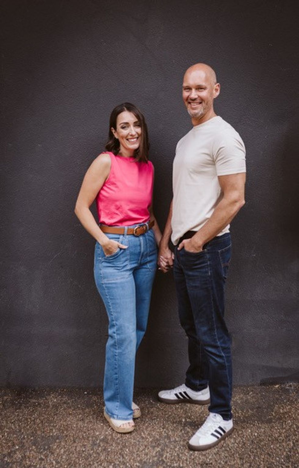 Chris and Lindsay posing after weight loss