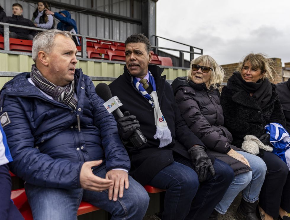 Chris Kamara interview local fans during the game as Eni Aluko plays for Pevensey.