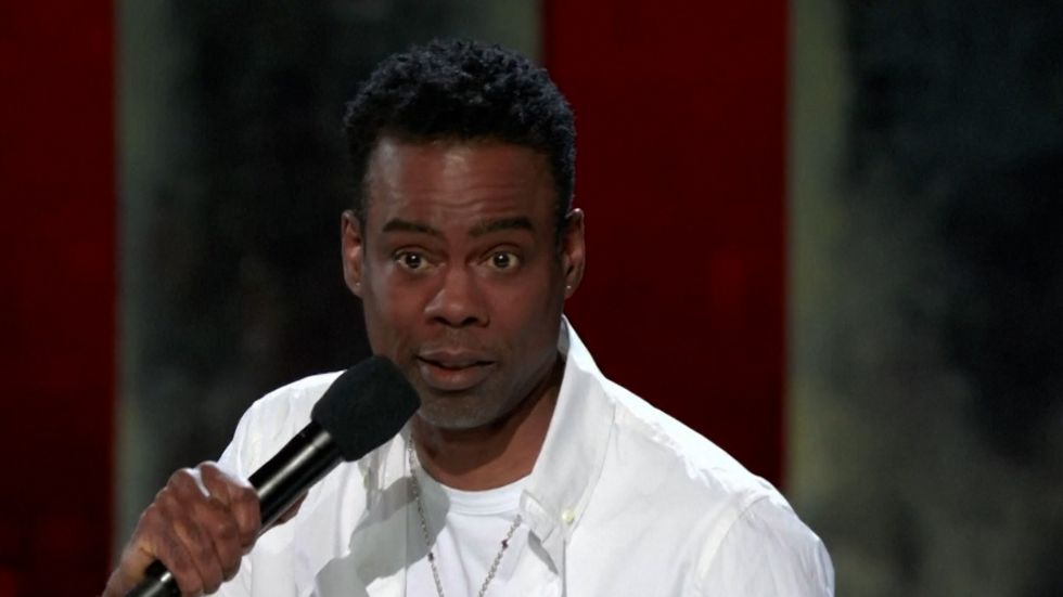 Chris Rock performing his stand-up routine as part of a Netflix special