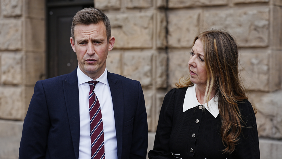Christine Colbert, owner of Dress Cheshire, with Cheshire Constabulary Detective Constable Gareth Yates