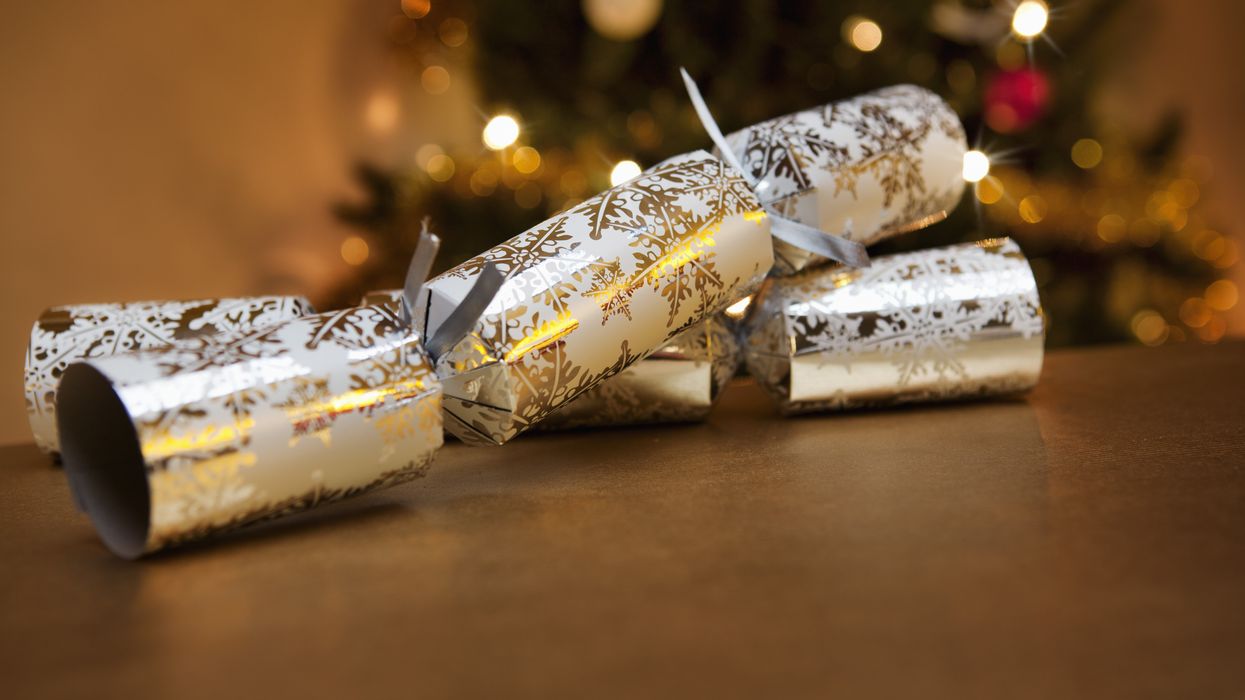 Christmas crackers laying on table