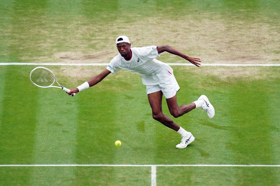 Christopher Eubanks in action against Daniil Medvedev during their gentlemen's quarter-finals