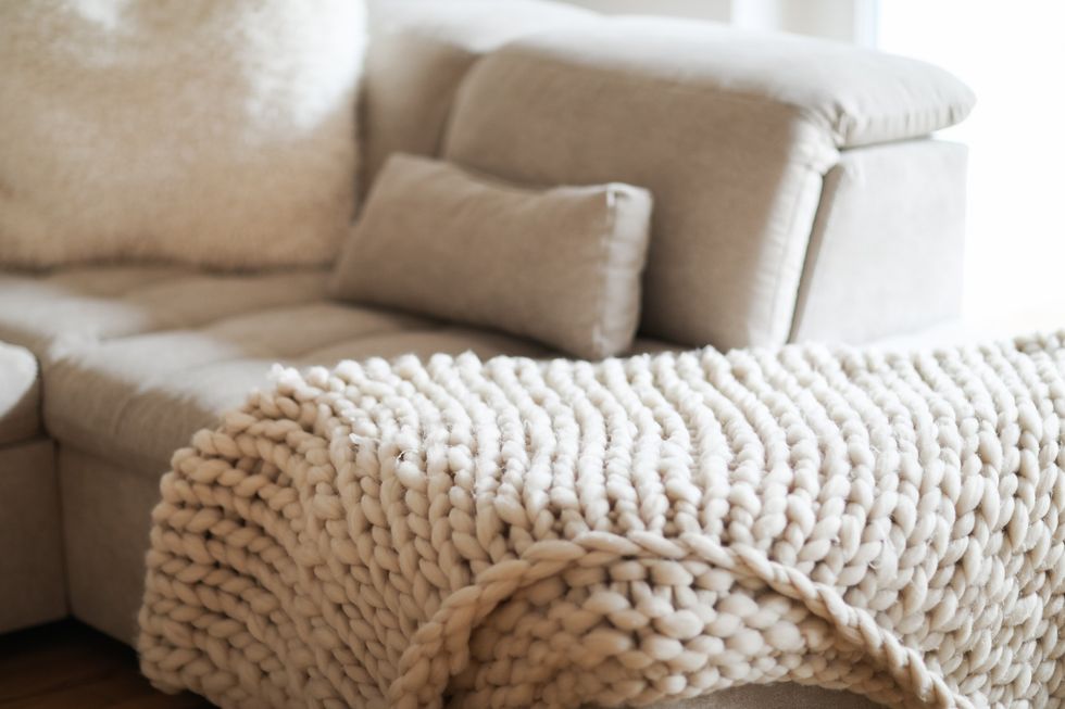 Chunky knit blanket on sofa