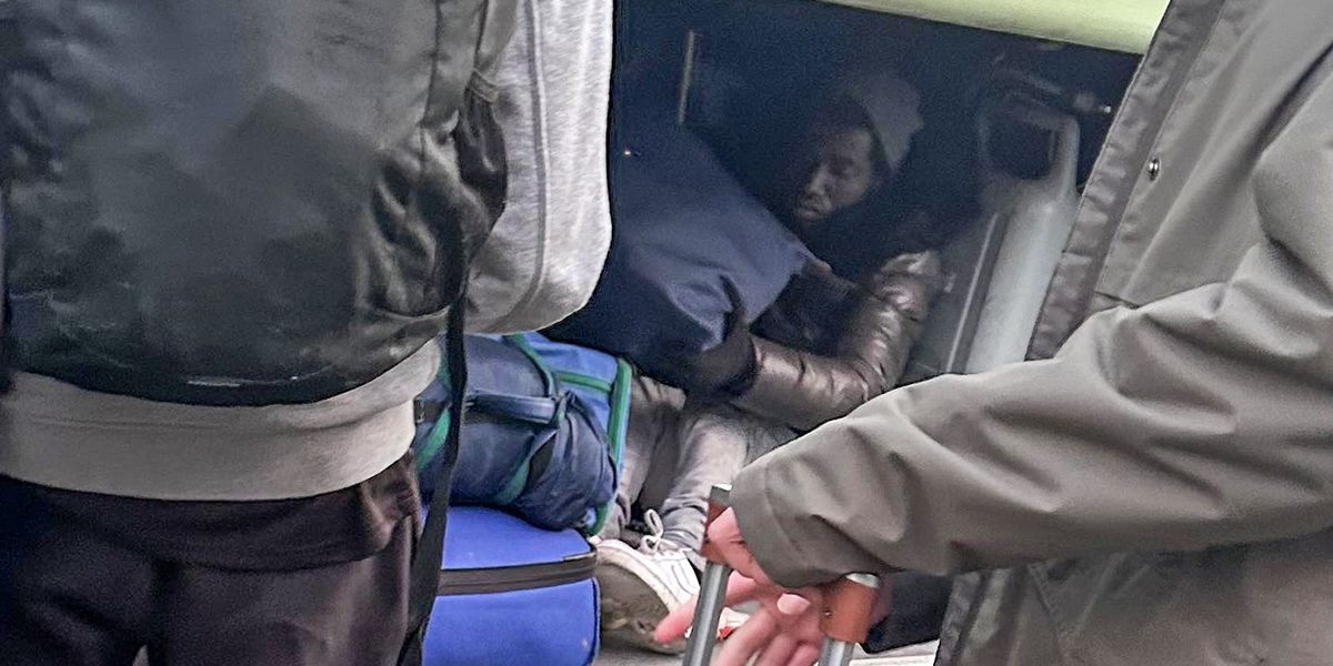Pupils left horrified after finding two migrants hiding in school coach on return from France trip