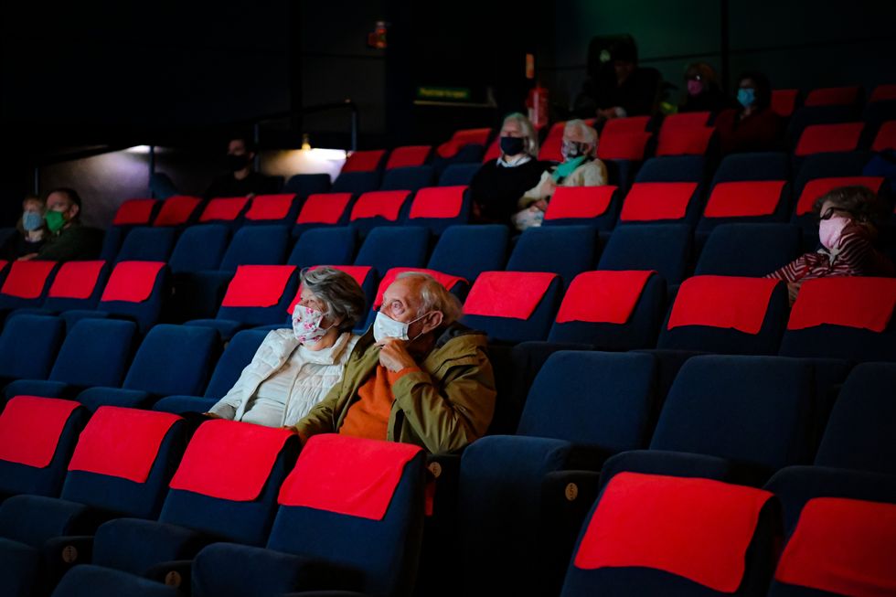 Cinema audiences watch Nomadland inside a movie theatre screen at Chapter, Cardiff.