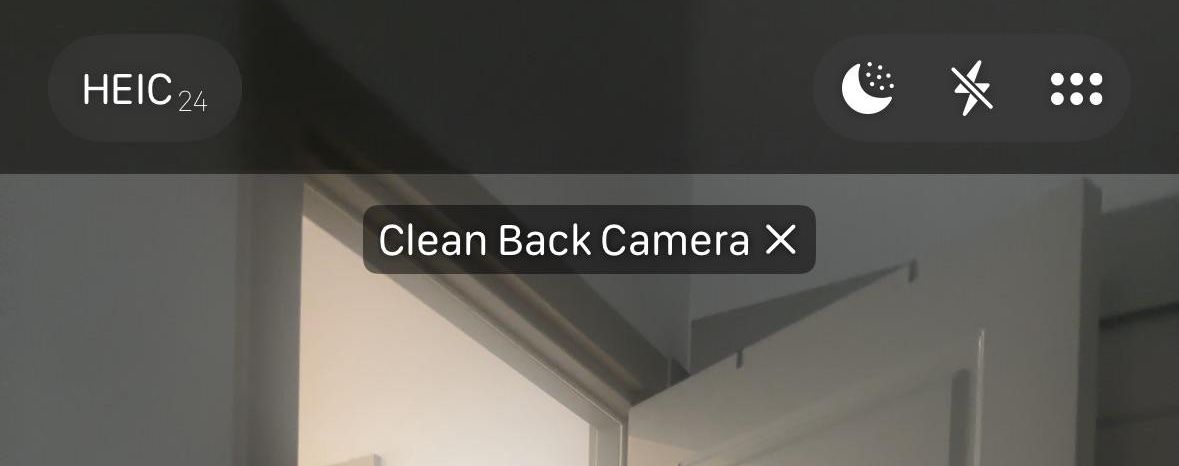 Clean Back Camera warning message pictured in the iOS 26 Camera app