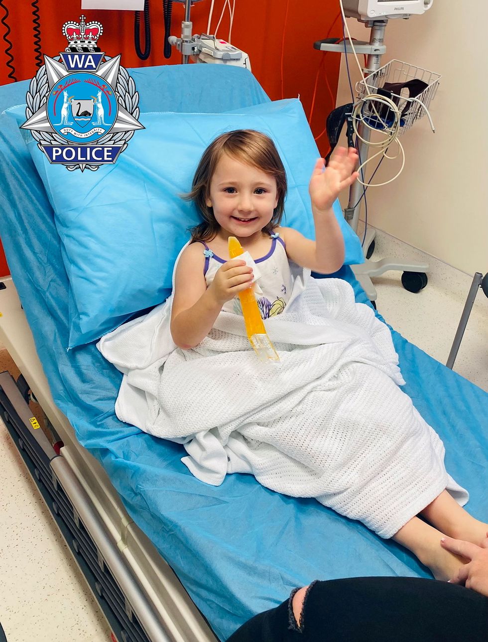 Cleo Smith, 4, who went missing from an Australian outback campsite more than two weeks ago and was found in a locked house on November 3, smiles from a hospital bed in Carnarvon, Australia, in this handout photo released to Reuters on November 3, 2021. Mandatory credit WESTERN AUSTRALIA POLICE FORCE/Handout via REUTERS ATTENTION EDITORS - THIS IMAGE HAS BEEN SUPPLIED BY A THIRD PARTY. MANDATORY CREDIT. NO RESALES. NO ARCHIVES. TPX IMAGES OF THE DAY