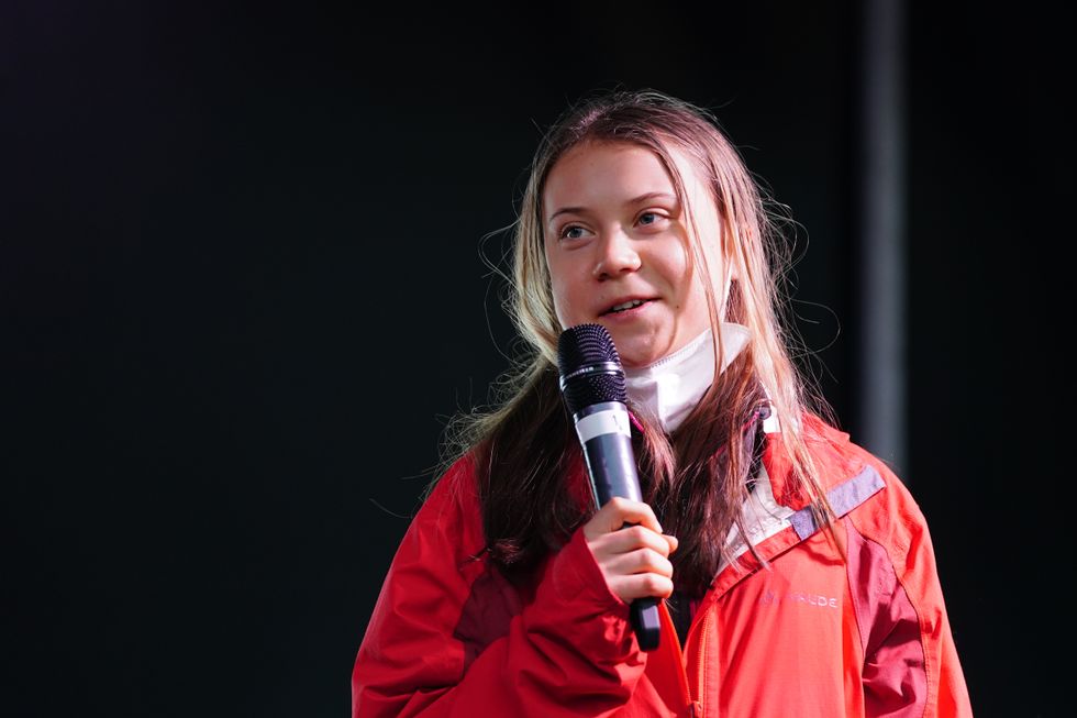 Climate activist Greta Thunberg speaking on the main stage in George Square as part of the Fridays for Future Scotland march during the Cop26 summit in Glasgow. Picture date: Friday November 5, 2021.
