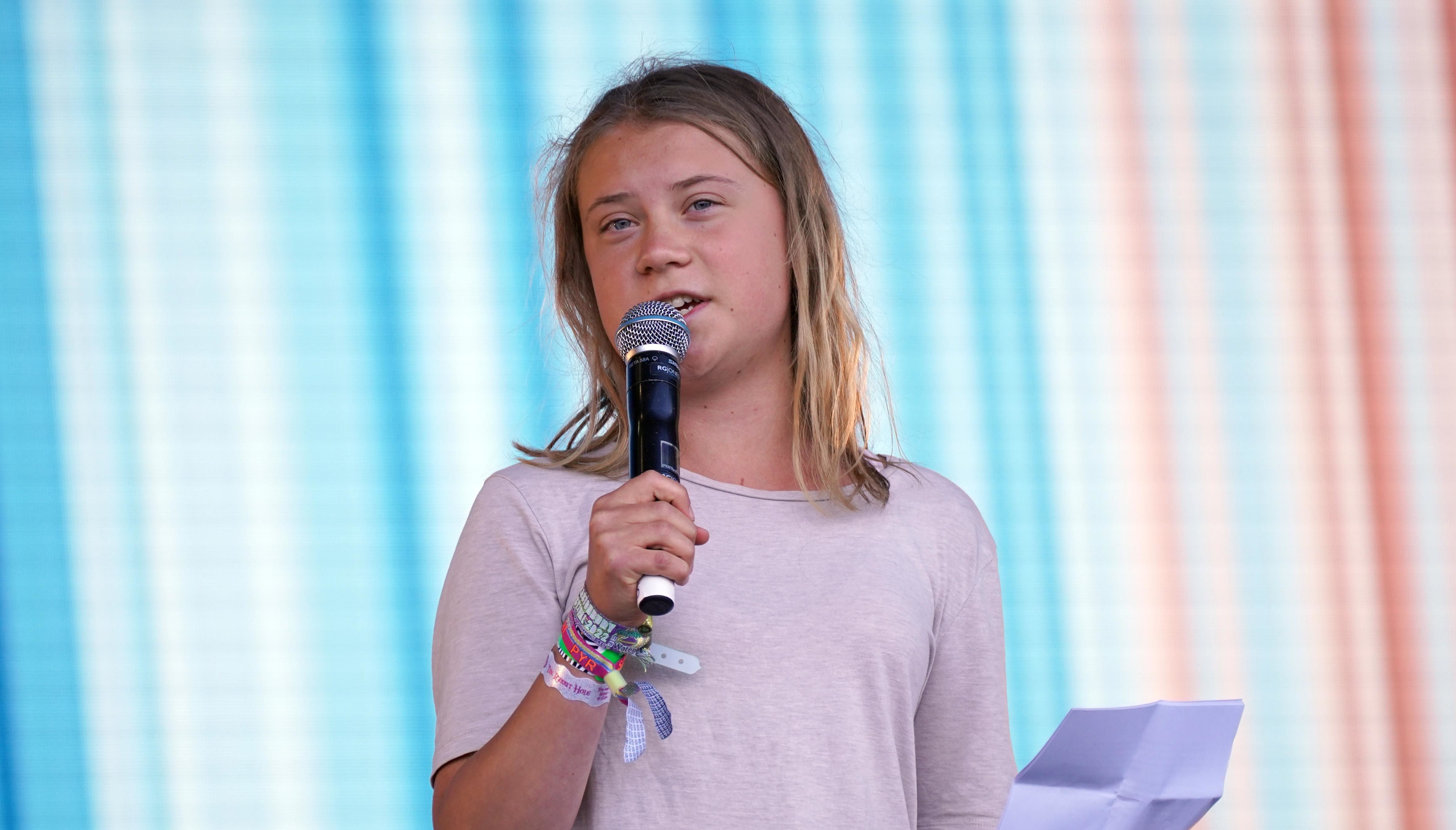 Climate activist Greta Thunberg speaking on the Pyramid Stage during the Glastonbury Festival at Worthy Farm in Somerset. Picture date: Saturday June 25, 2022.