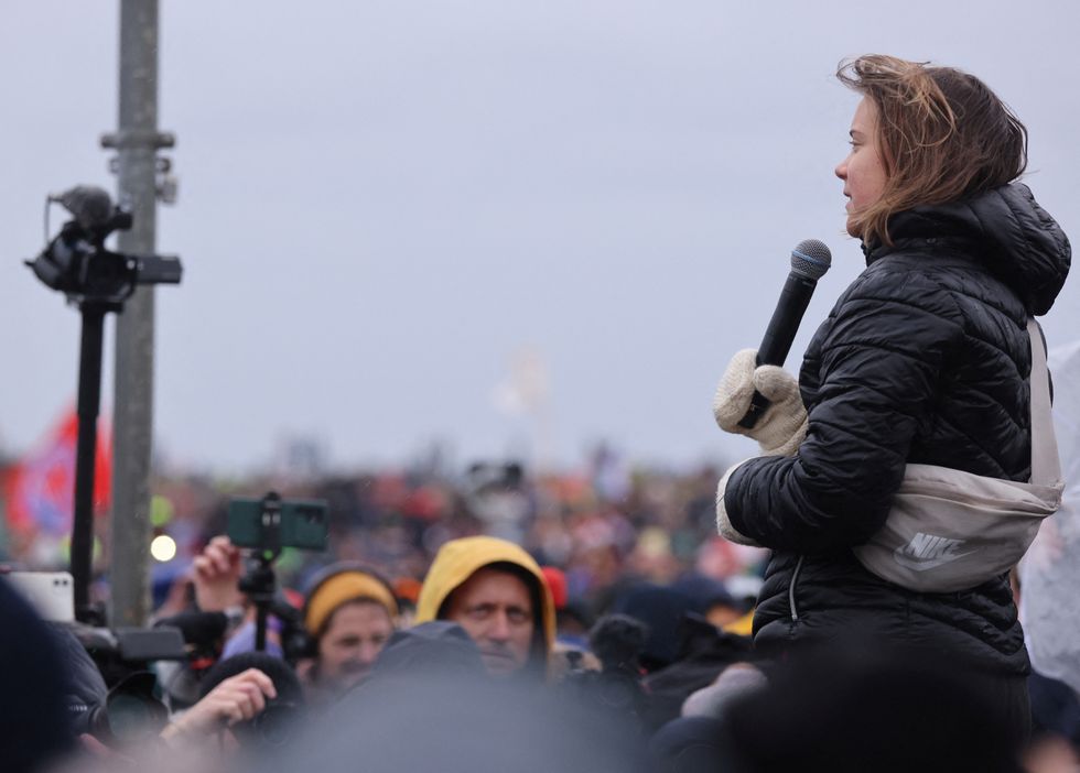 Climate activist Greta Thunberg speaks during a protest against the expansion of Germany's utility RWE's Garzweiler open-cast lignite mine to Luetzerath, Germany, January 14, 2023. REUTERS/Thilo Schmuelgen