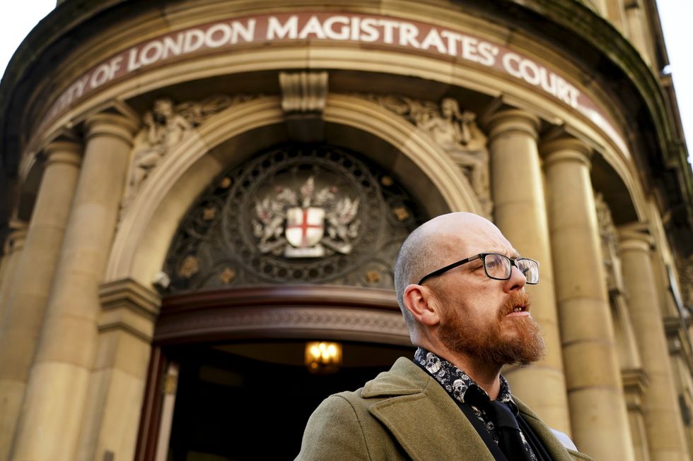 Climate activist Simon Bramwell speaks to the media outside the City Of London Magistrates' Court