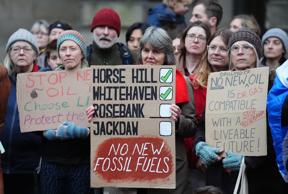 Climate activists from Greenpeace and Uplift during a demonstration outside the Scottish Court of Session, Edinburgh\u200b