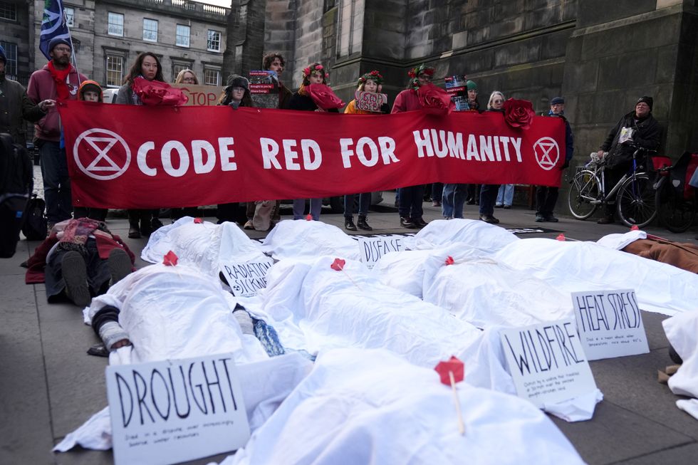 Climate activists from Greenpeace and Uplift during a demonstration outside the Scottish Court of Session\u200b