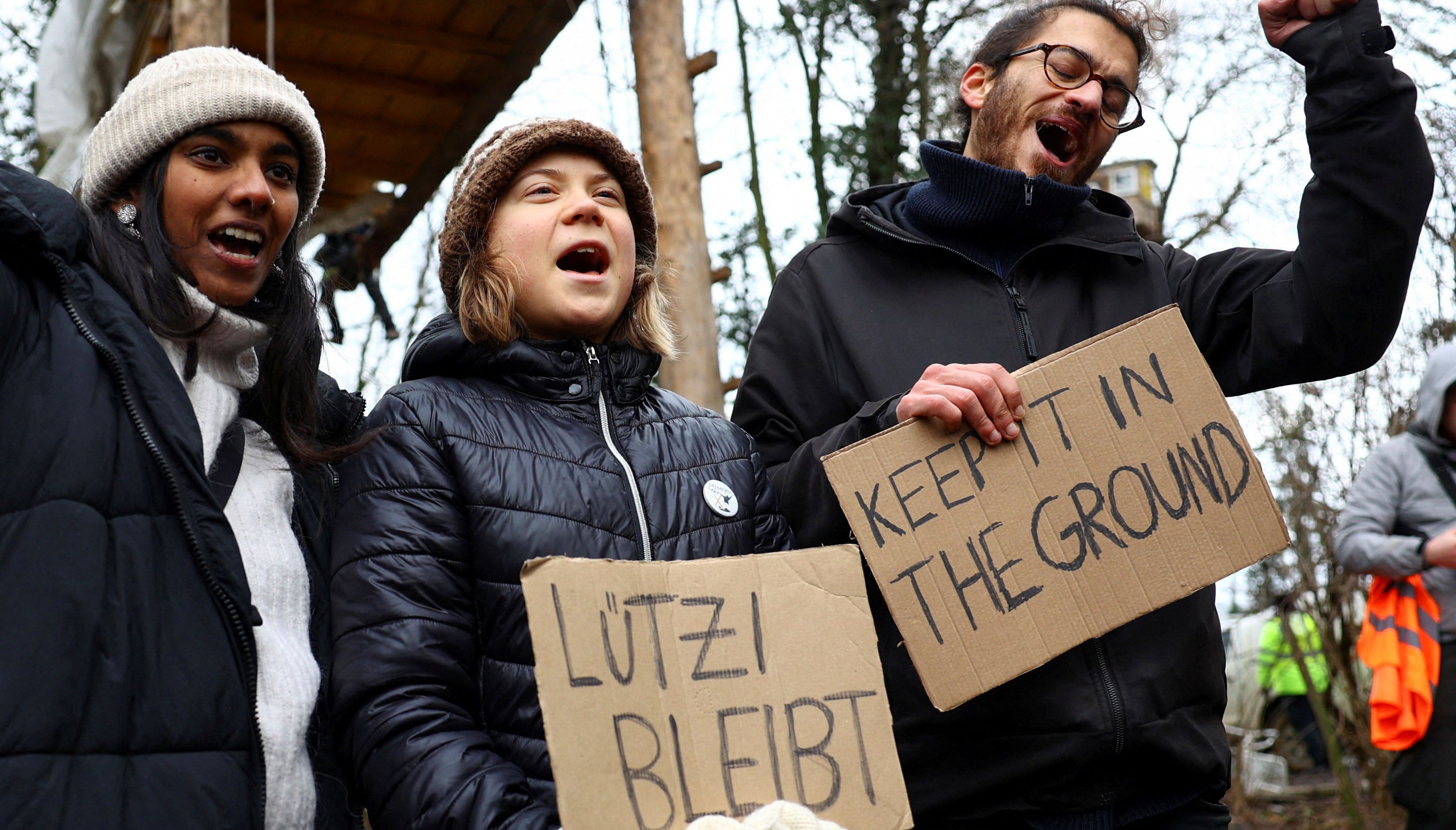 Climate activists Lakshmi Thevasagayam, Florian Oezcan, and Greta Thunberg protest against the expansion of the Garzweiler open-cast lignite mine of Germany's utility RWE, in Luetzerath, Germany, January 13, 2023. REUTERS/Christian Mang